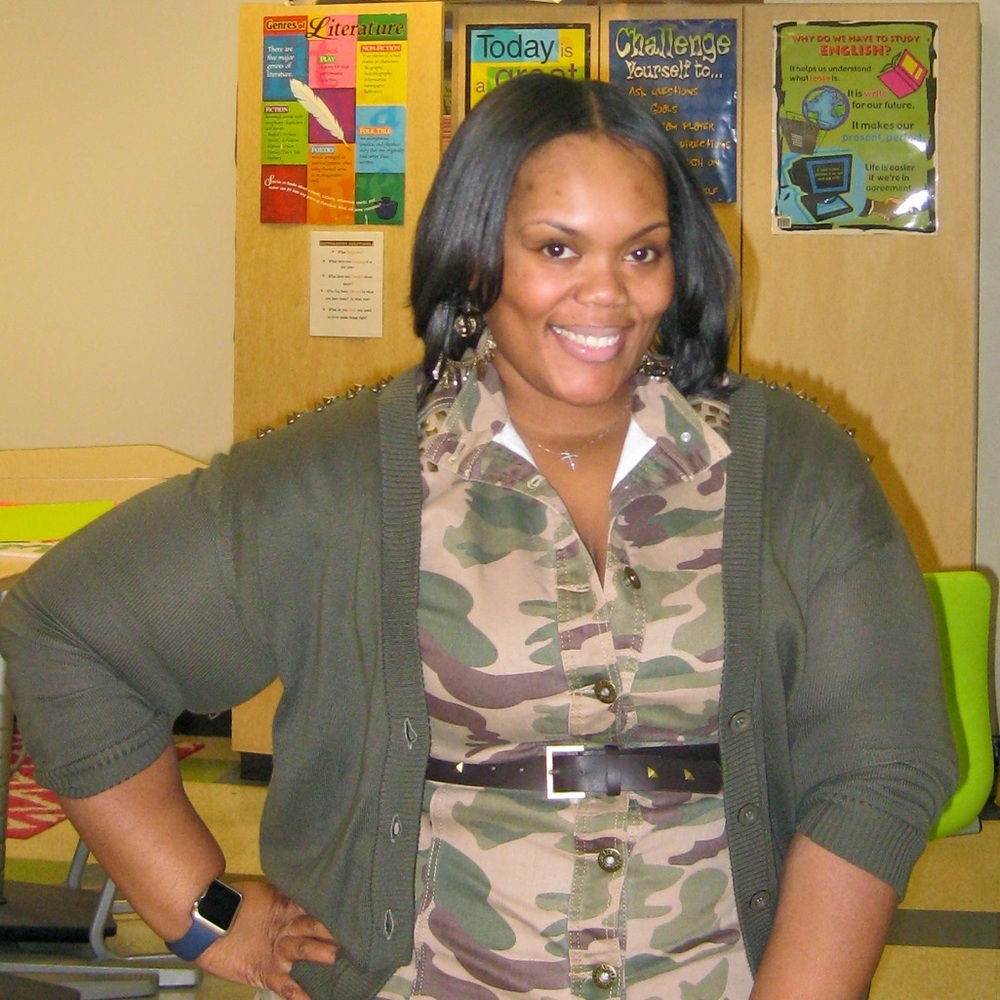 Green cardigan with spike grommets